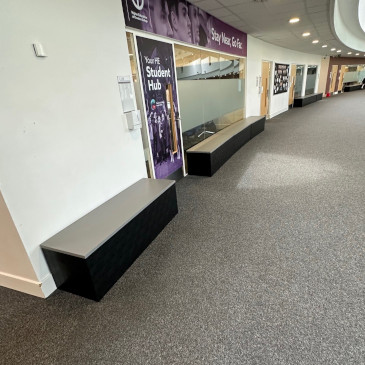 Morph benches provide new seating in the atrium along a curved wall